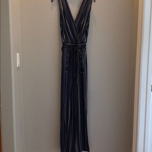 navy and white jumpsuit with pockets